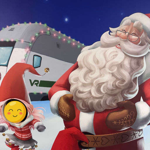 ロヴァニエミ駅にあった顔だしパネル。サンタさんと2ショット